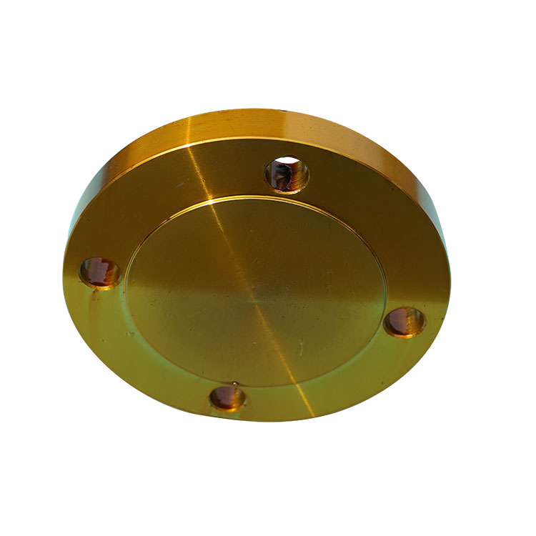 What is the purpose of the raised face or flat face on a blind flange